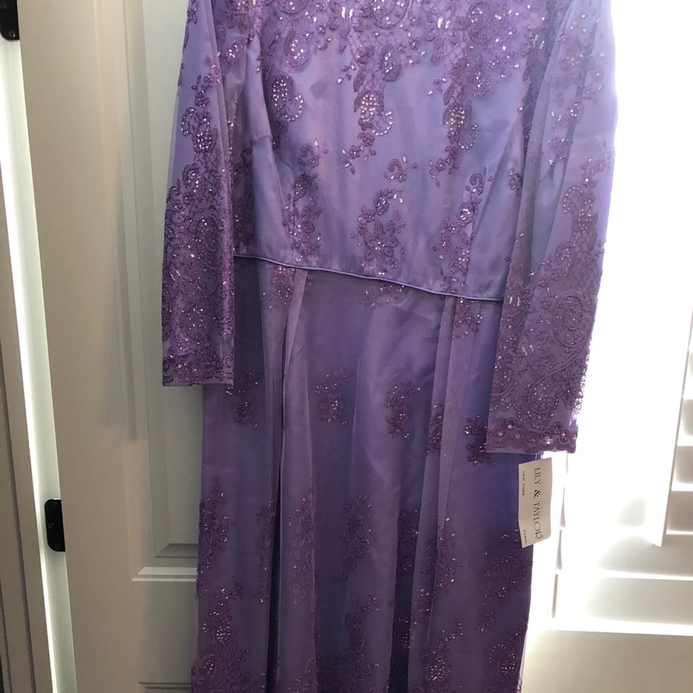 Look Royal in the purple dress by Lily and Taylor